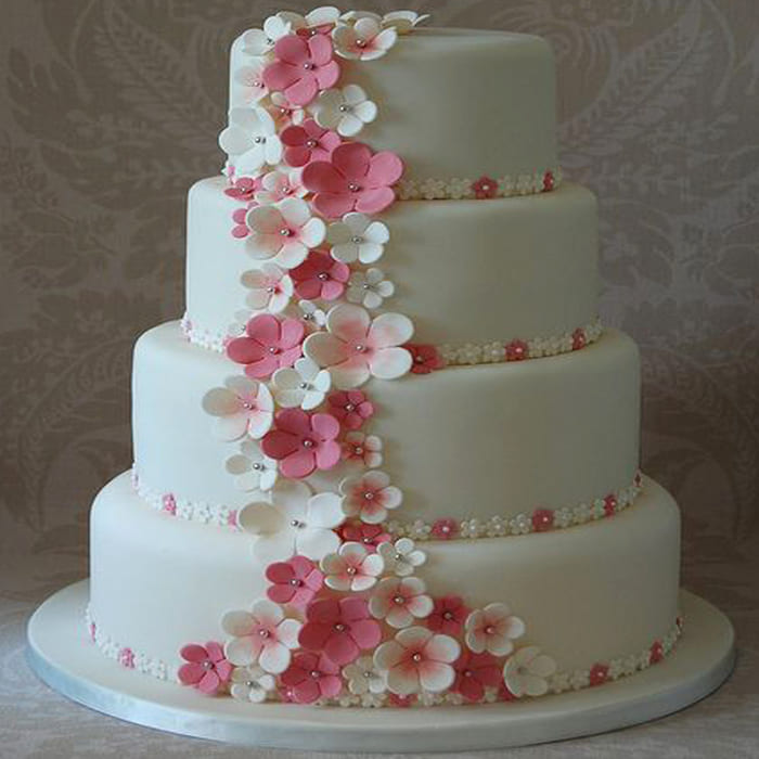WED050 4 tier ivory round wedding cake with flowers and swags 50 78 | Round wedding  cakes, 4 tier wedding cake, Wedding cakes with flowers